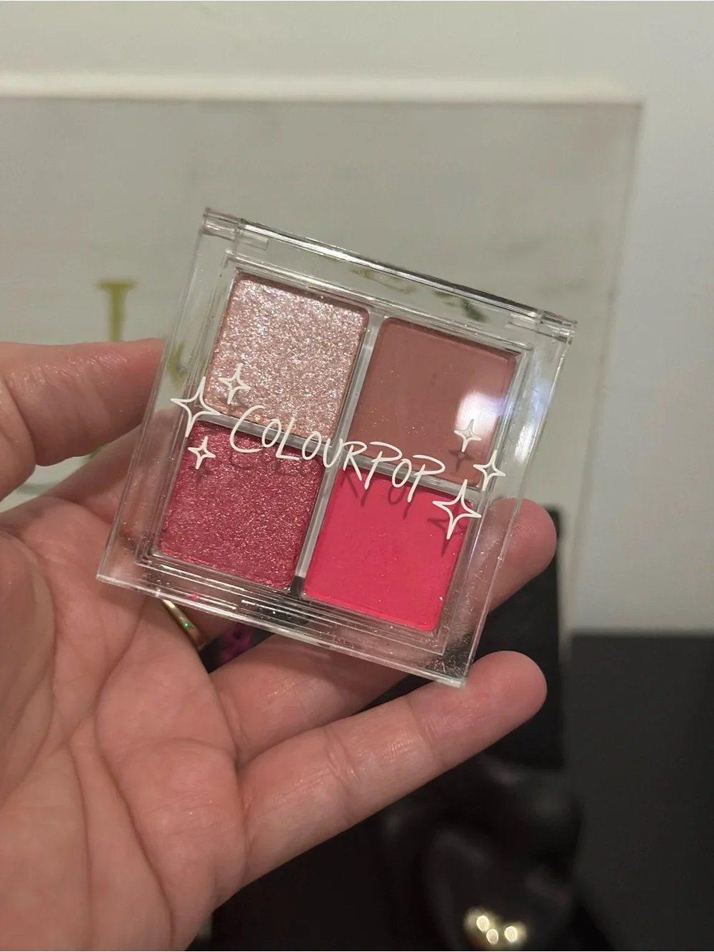 Makeup essentials (7 pieces) with pouch.